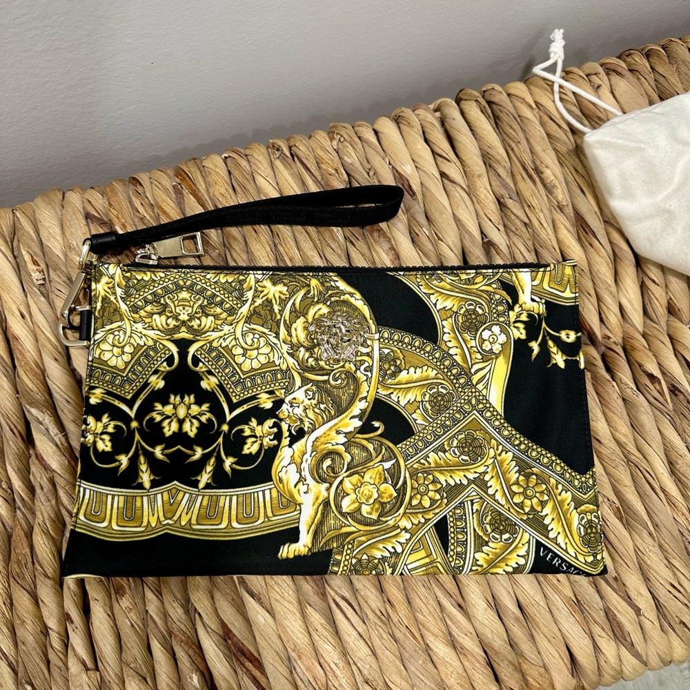 Versace black and gold wristlet